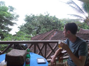 Ben enjoying a Bintang beer on our balcony